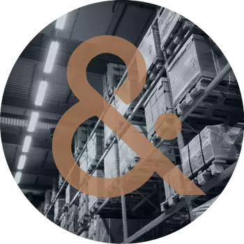 Image of warehouse shelving with packaged products. The "&" character from the CA&S logo is overlaid on the image | Home | CA&S Group